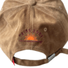 Gorra verde 6 paneles de acabado efecto gastado. Fabricada en algodón,  con cierre ajustable de hebilla y orificios de ventilación bordados tribu zone